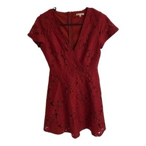 Black Swan lace faux wrap mini dress